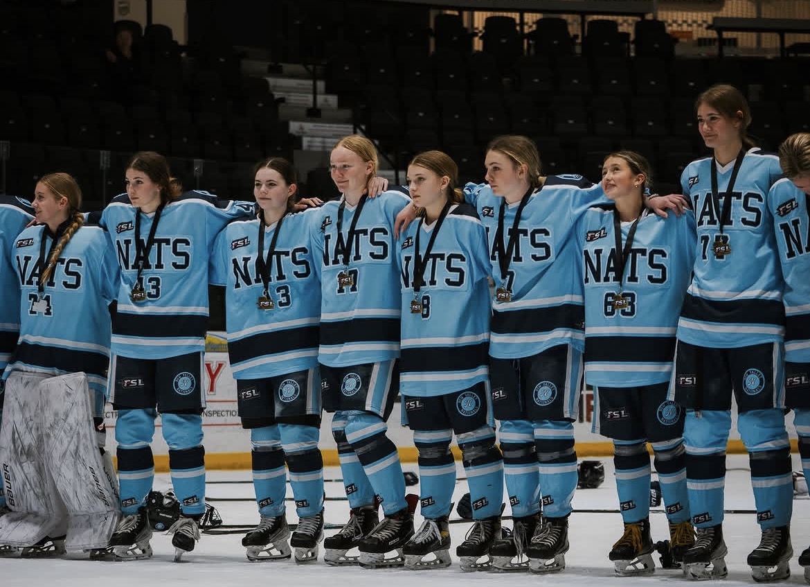 Bow Valley Nationals team lined up on the ice